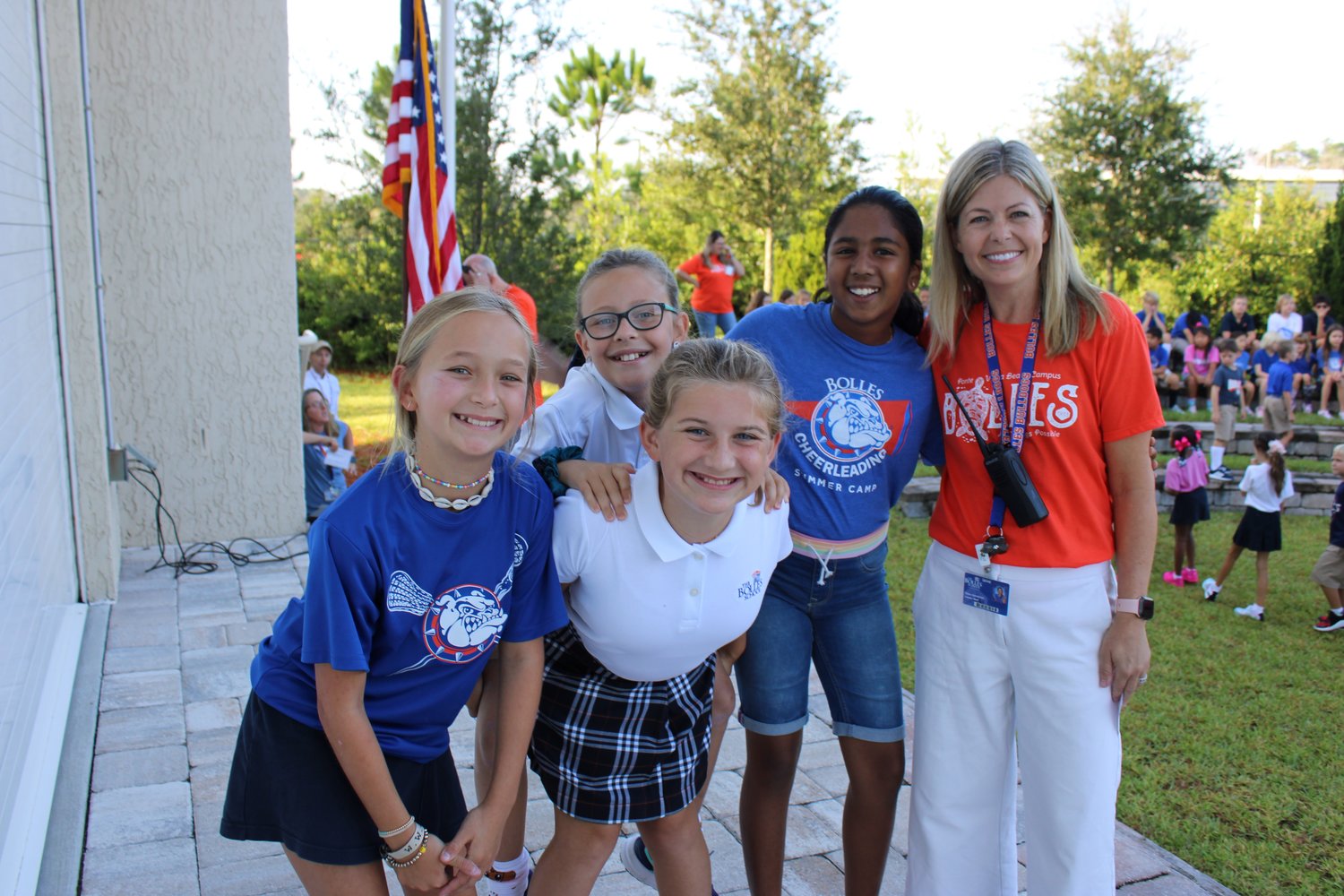 Bolles Lower School Ponte Vedra Beach Campus Head of School Stacey Hendershot is seen with a group of happy students.